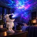 Astronaut Galaxy Star Projector — 7 Color Night Light